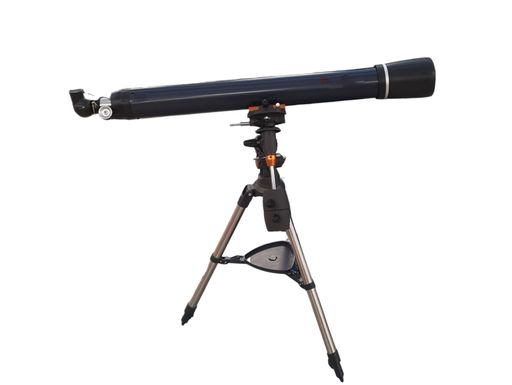 A black and silver telescope standing on a metal tripod against an isolated white background