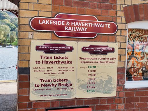 An advertising poster about steamer trips on lake Windermere