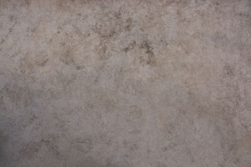 A closeup shot of a smooth concrete wall with a marbling effect