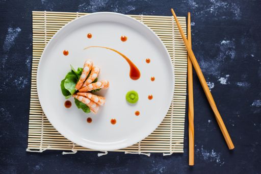 A top view of delicious Japanese shrimps with wasabi and soy sauce on the table
