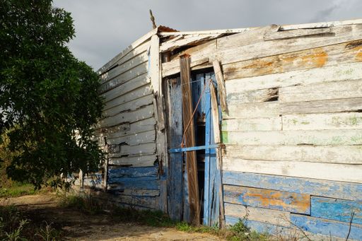 A closeup shot of an old abandoned wooden house in Cacela Velha in Algarve Portugal