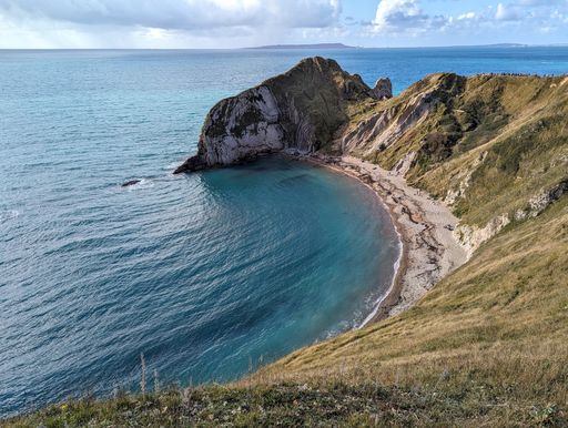 An aerial view of the scenic Lulworth Cove in the United Kingdom