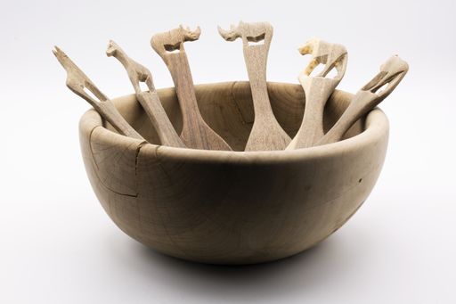 A wooden utensil for the kitchen isolated on white background