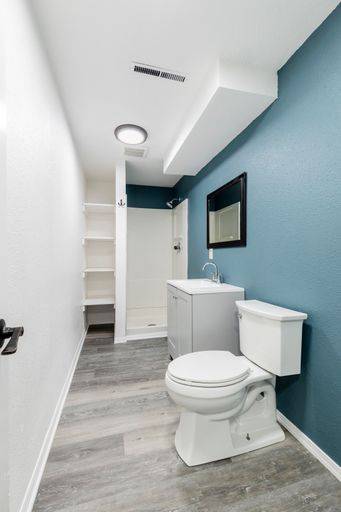 An interior of a modern bathroom design