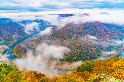 A scenic view of mountains with colorful autumn trees in Beaver, West Virginia