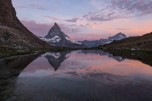 A gorgeous view of Mount. Matterhorn in Zermatt, Switzerland during a purple sunset
