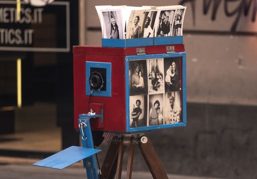 Retro wooden photo camera in the streets of Naples, Italy, May 29th 2021.