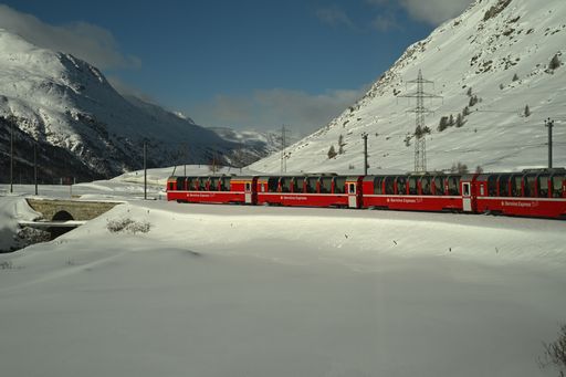 A train ride on the famous Bernina Express in Switzerland going over the mountains and passing beautiful landscapes