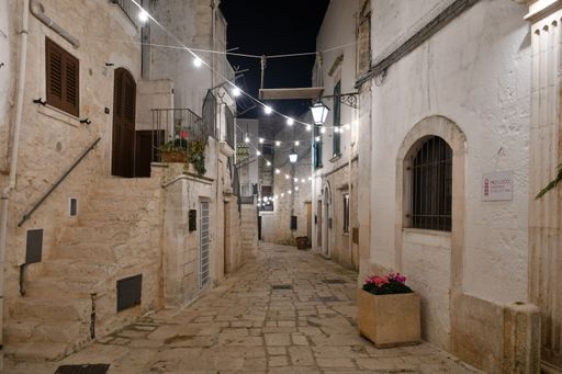 A small Apulian town decorated with Christmas decorations in the streets and on the walls.