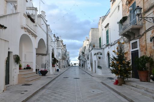 A small Apulian town decorated with Christmas decorations in the streets and on the walls.