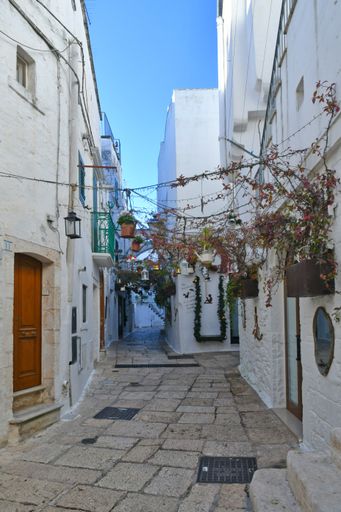 A small Apulian town decorated with Christmas decorations in the streets and on the walls.