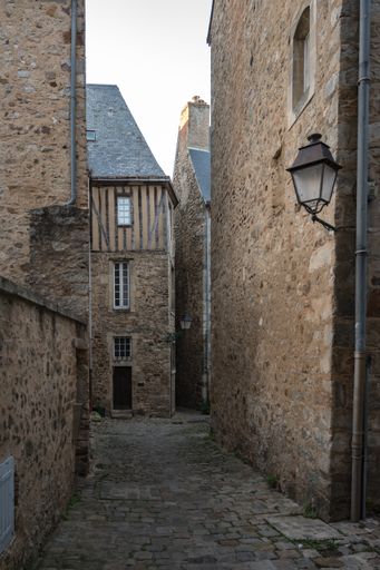 Detail of a pretty alley in the old town of Le Mans, houses with stone facades