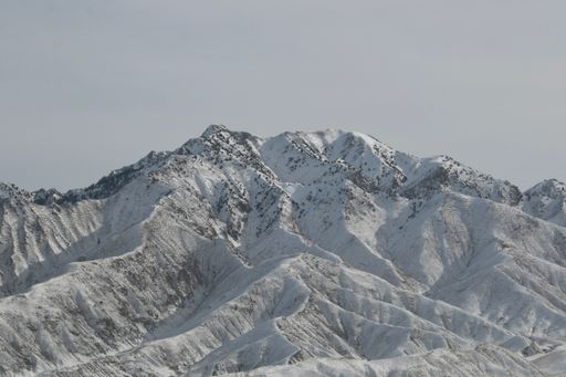 A majestic snow-covered mountain landscape in the wintertime