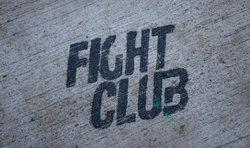 A sign of "Fight club" on a wall in Chinatown. Manhattan, New York