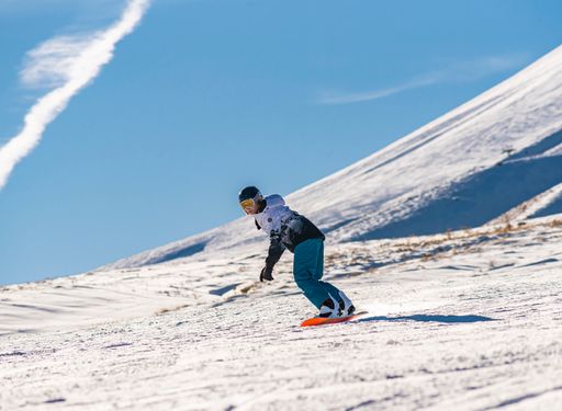A shot of people skiing on the ski slope