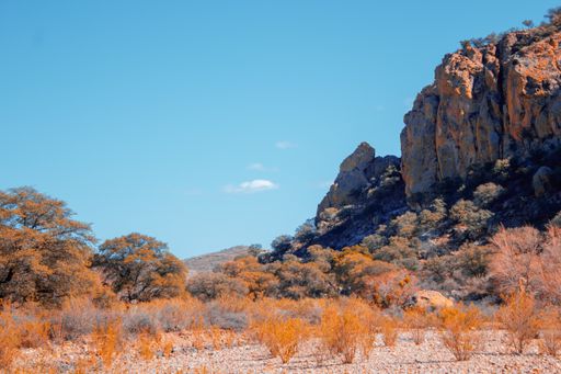 A beautiful shot of dry hillsides under a blue sky