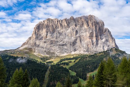 This stunning mountain landscape features the Gardena Pass in South Tyrol, Italy
