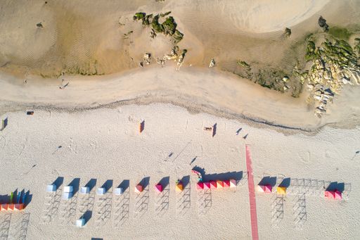 An aerial drone view of a beach in summertime in Ancora, Portugal