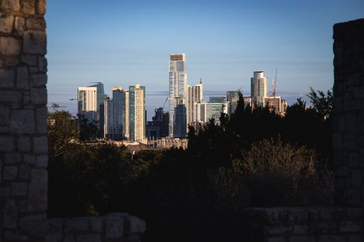 A scenic view of the city skyline of downtown Austin, Texas at sunset