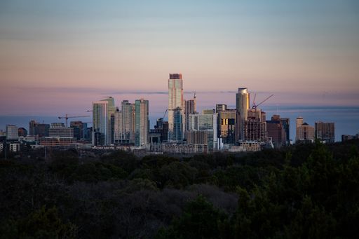 A scenic view of the city skyline of downtown Austin, Texas at sunset