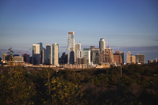 A scenic view of the city skyline of downtown Austin, Texas at sunset