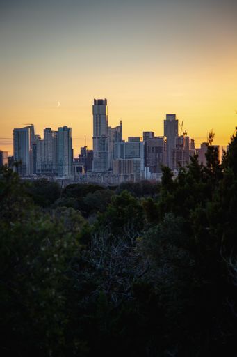 A scenic view of the city skyline of downtown Austin, Texas at sunset