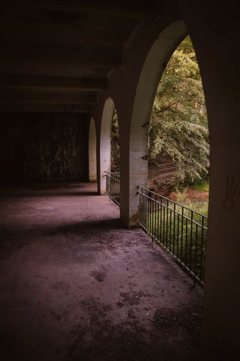 A vertical of Dunbar cave with arched balconies