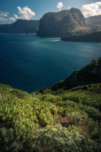 A stunning coastal landscape surrounded by rock cliffs