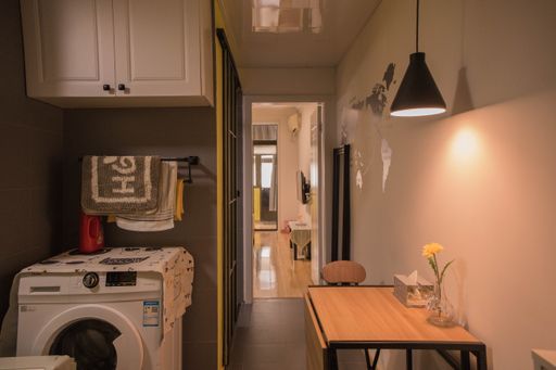 An interior of a cozy laundry room design