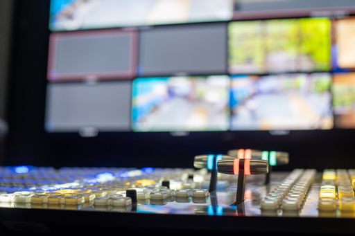 A selective focus shot of TV broadcast switcher and multiview
