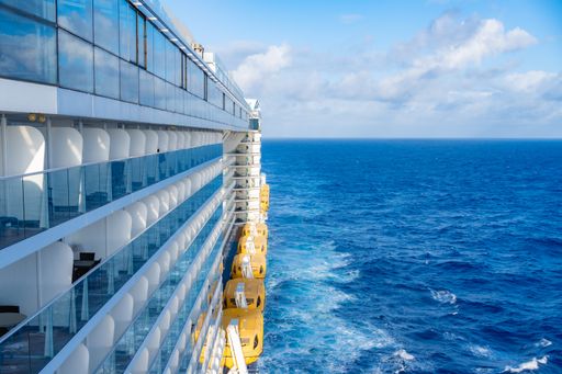Captivating aerial view of a large cruise liner sailing in the vast expanse of the ocean