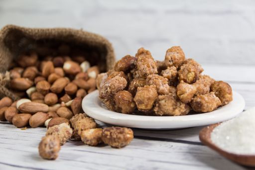 plate with caramelised and ingredients, sugar and raw peanuts