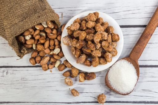 plate with caramelised and ingredients, sugar and raw peanuts