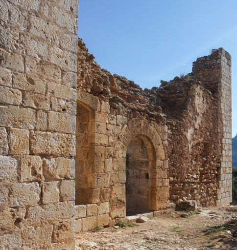 The ruins of a historical building on a sunny day