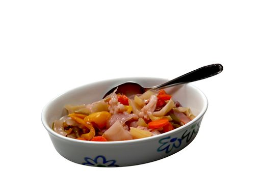 A white ceramic bowl filled with delicious looking pickled vegetables isolated on a white background