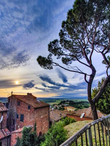 A vertical shot of San Gimignano medieval village in Tuscany, Italy under a beautiful sky