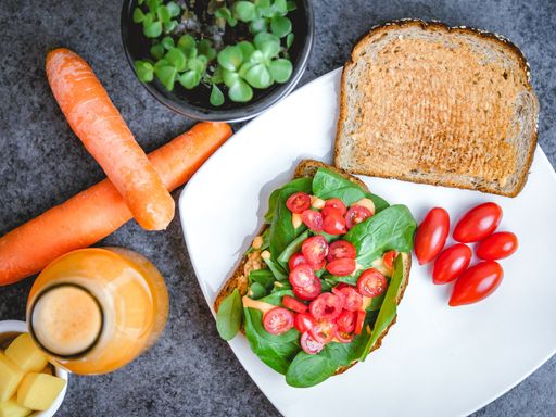 A top view of healthy food and carrjuice on the table