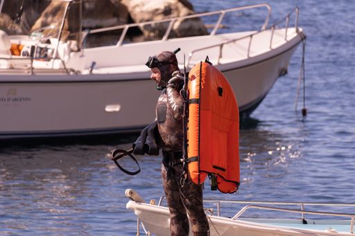 A man ready to dive in Naples, Italy, Jun 03th 2021.