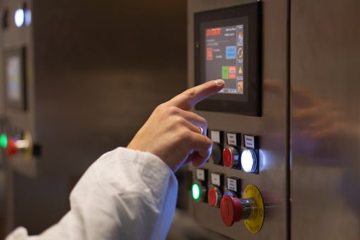 Engineer operating touch computer in industrial plant in Capua, Italy, Jun 03th 2021.