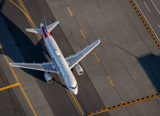An aerial shot of American Airlines Airbus 319 taxiing at Boston's Logan International Airport