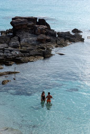 Formentera, Spain : 2021 June 04 : Young people in Formentera beach of Calo d es Mort in Balearic Islands in summer 2021