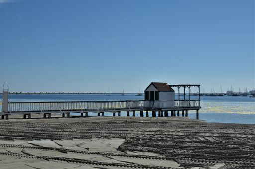 A view of a wooden jetty at a holiday resort at the Mar Menor in Murcia, Spain