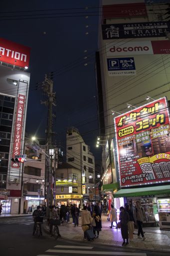Osaka, Japan- 27 Nov, 2019: Crowd of peoples and tourists at Namba on night time. Namba is one of popular shopping and eating area of Osaka.