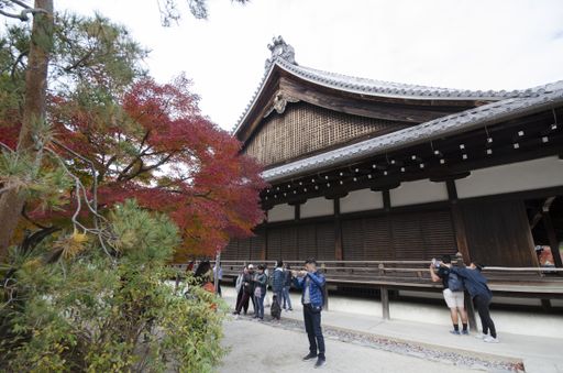Kyoto, Japan-26 Nov, 2019: Tourists enjoy autumn at Tenryuji gardens in Arashiyama, Kyoto, Japan.