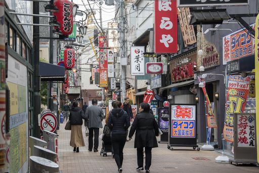 Osaka, Japan- 28 Nov, 2019: People visit Dotonbori street in Osaka, Japan. Dotonbori is the main entertainment area of Osaka.