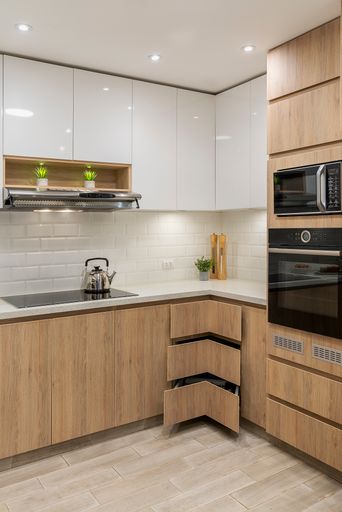 The built-in ovens and electric griddle in the kitchen modules