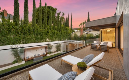 Outdoor patio with furniture and wooden deck