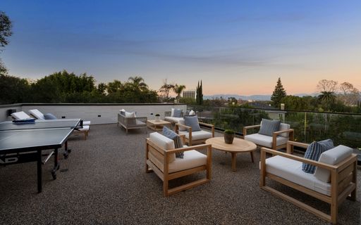 Outdoor table tennis set on rooftop near balcony, New Construction Home in Tarzana, California