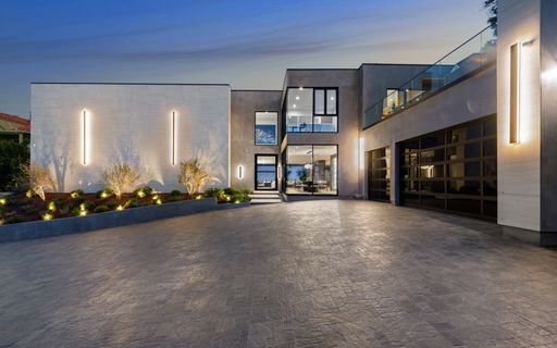 Modern home with landscaped concrete driveway, New Construction Home in Tarzana, California