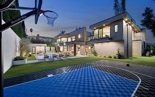 Spacious home featuring an outdoor basketball court with hoop, New Construction Home in Tarzana, California